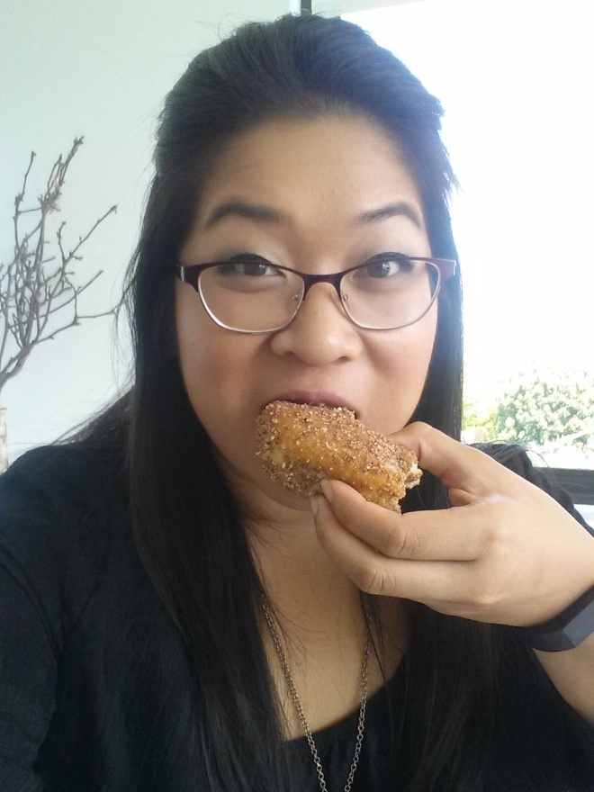 Another unflattering photo of me stuffing my face with a donut. Standard.